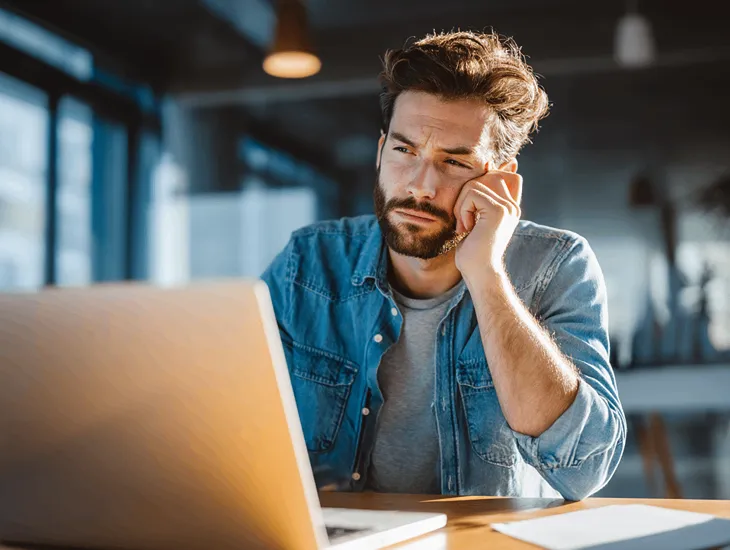 Foreign investor inspecting land zoning in Pererenan Bali with legal consultant to verify green zone restrictions